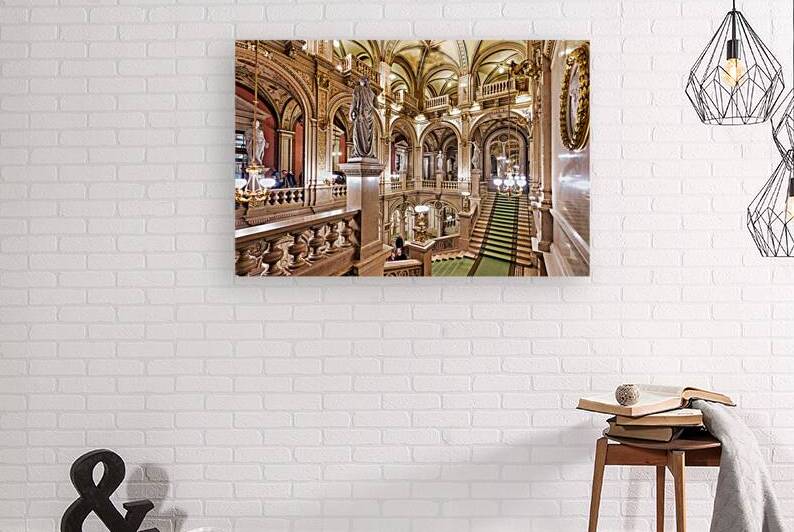 Luxurious opera house interior with grand staircase and statues. by Marco Brivio