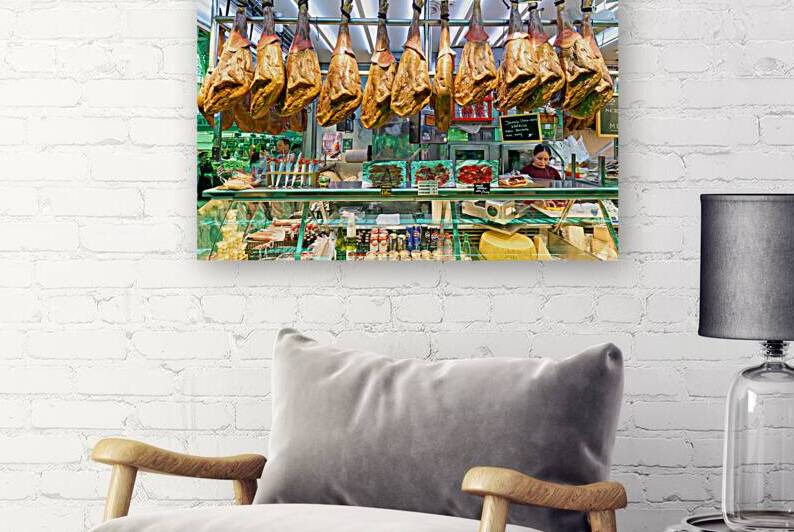 Central Market in Valencia showcases meat display and vendor act by Marco Brivio