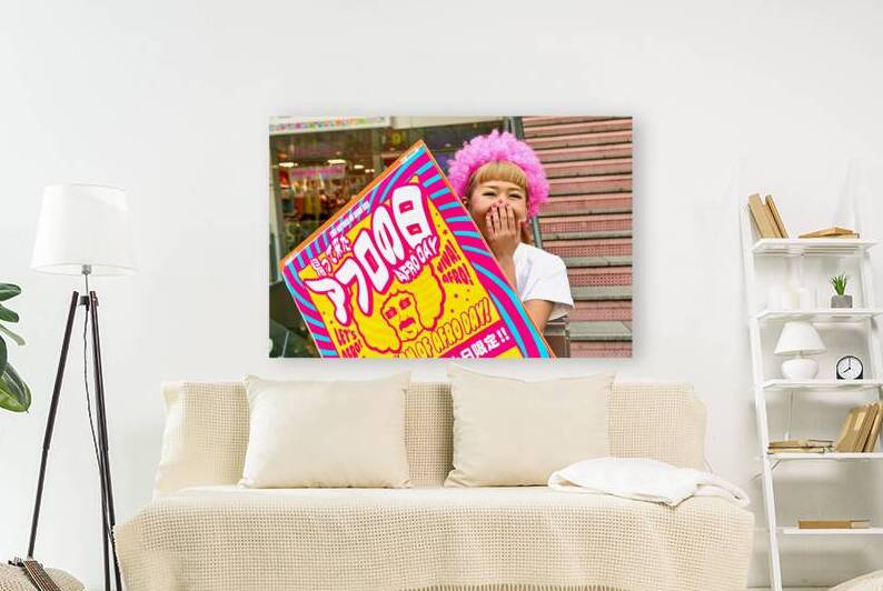 Lolita girl holds sign in Shibuya District of Tokyo during Afro  by Marco Brivio
