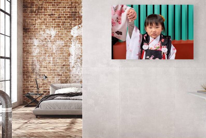 Child in traditional dress in Asakusa Tokyo during a cultural o by Marco Brivio