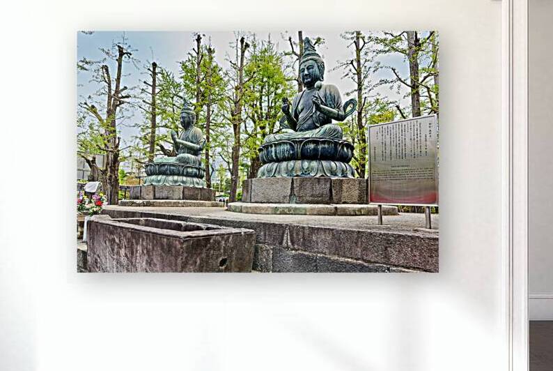 Two bronze Buddha statues at Sensoji Temple in Tokyo Japan by Marco Brivio