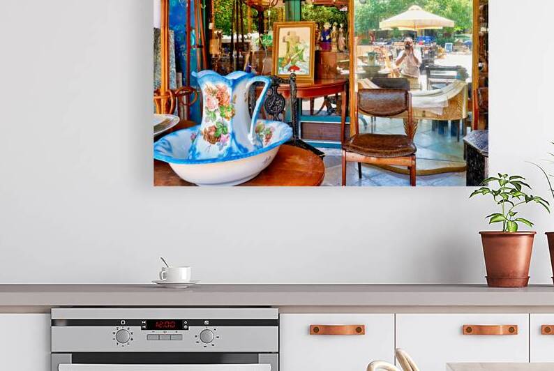 Visitors explore the flea market at Monastiraki in Athens Greece by Marco Brivio