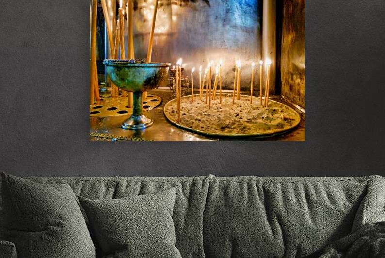 Votive candles lit inside Ekklisia Panagia Grigorousa in Athens  by Marco Brivio