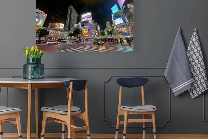 Shibuya Tokyo: vibrant night lights and bustling traffic by Marco Brivio