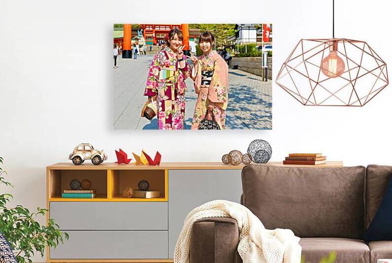 Young women enjoy Fushimi Inari Taisha Shrine in Kyoto Japan by Marco Brivio