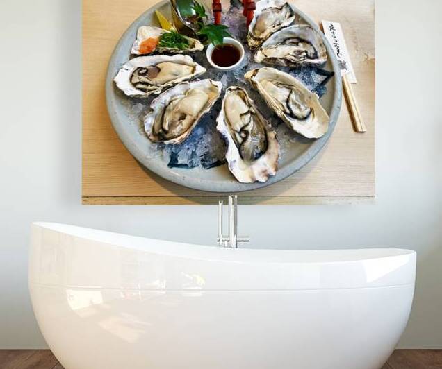 Fresh giant oysters served in Miyajima Hiroshima region of Japa by Marco Brivio