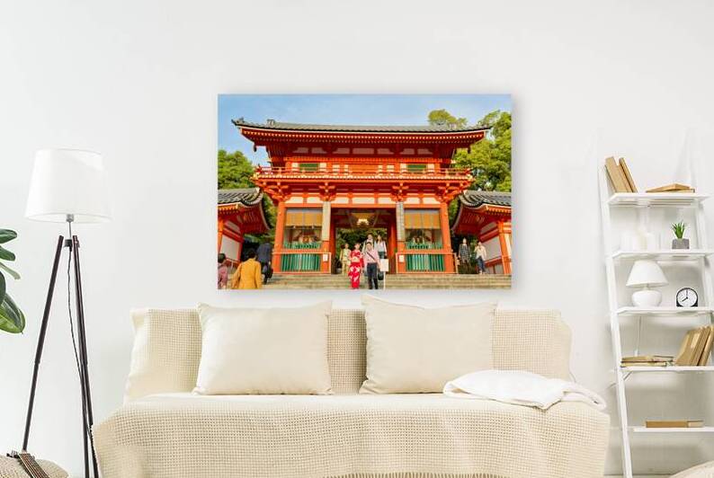 Yasaka shrine temple in Kyoto during a sunny day with visitors by Marco Brivio