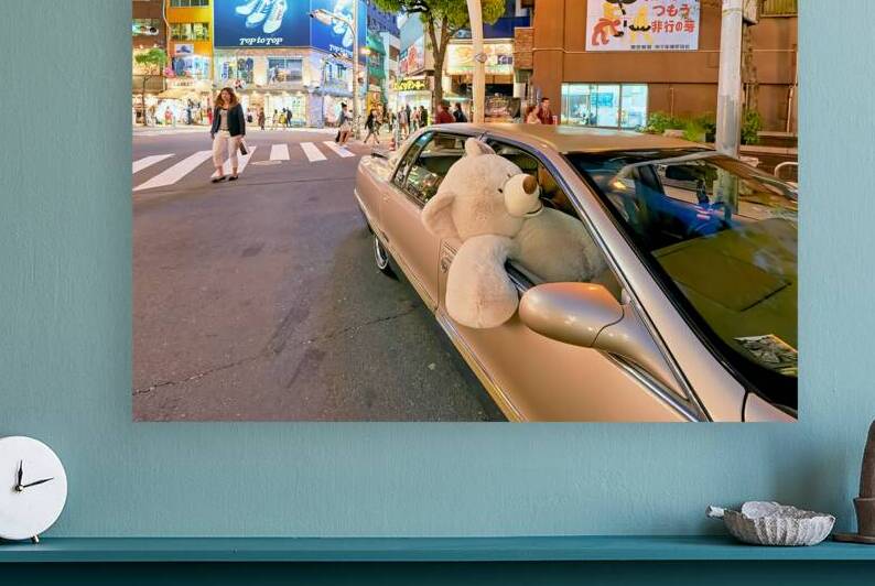 Large teddy bear in a car in America Mura district of Osaka by Marco Brivio