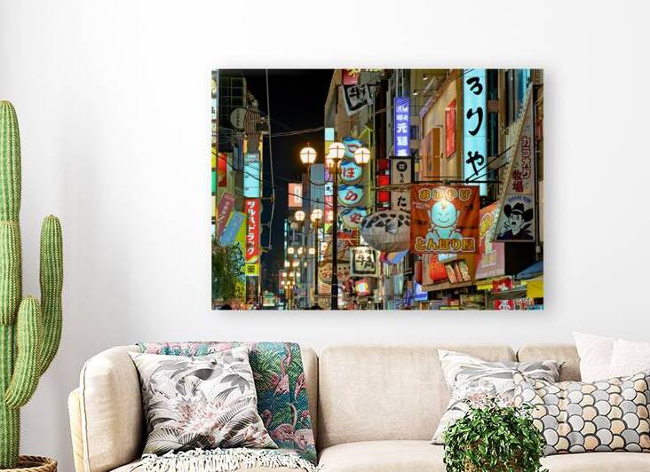 Illuminated signboards in Dotonbori District at sunset in Osaka by Marco Brivio