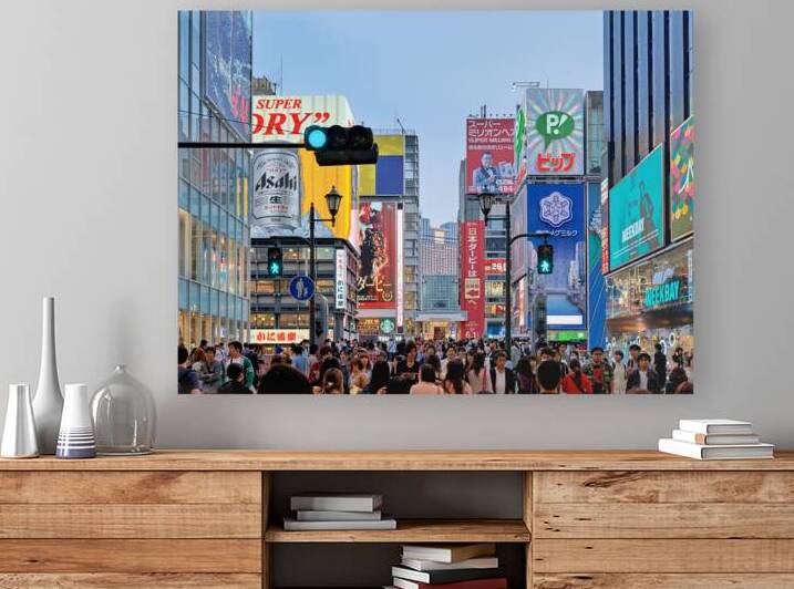 Signboards in Dotonbori District draw crowds during sunset in Os by Marco Brivio
