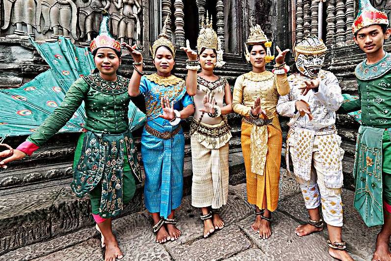 Traditional Cambodian dancers in elaborate costumes at ancient t by Marco Brivio