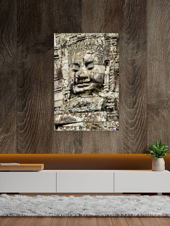 Serene stone face carving Bayon temple Angkor. by Marco Brivio