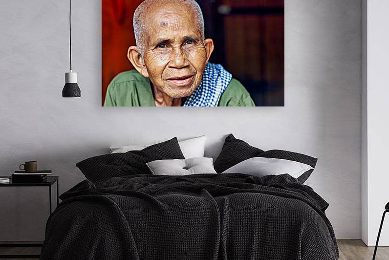 Close up portrait of an elderly person with a fly on head. by Marco Brivio