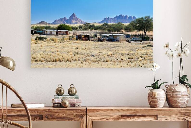 Village near Spizkoppe granite peaks in Namibias Namib Desert by Marco Brivio