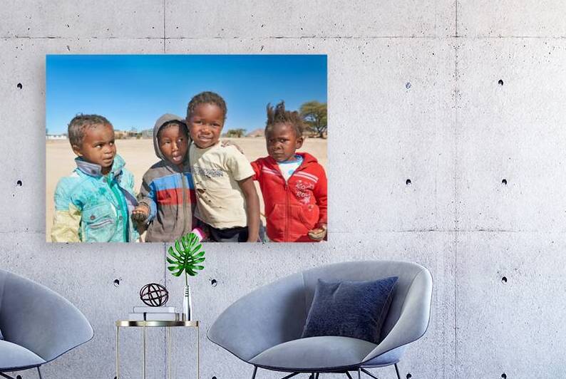 Group of children in Damaraland Namibia on a sunny day by Marco Brivio