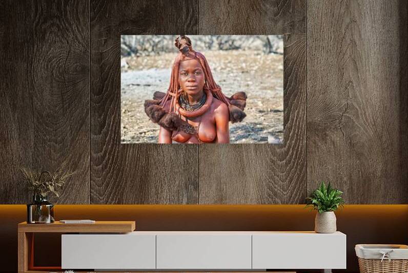 Himba woman wearing traditional hair headdress in Namibia by Marco Brivio