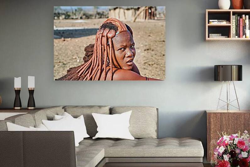 Traditional hair headdress worn by woman in Himba village in Nam by Marco Brivio