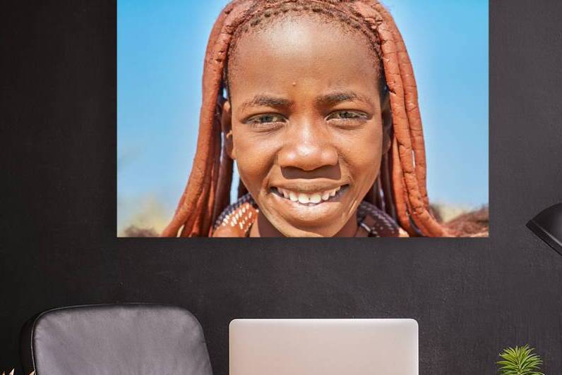 Portrait of Himba woman in Kunene region of Namibia by Marco Brivio