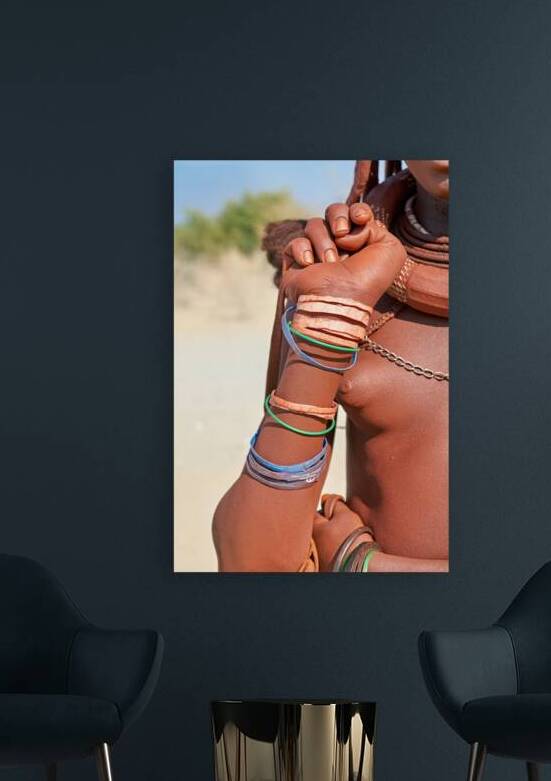 Portrait of Himba woman in Kunene region of Namibia with bracele by Marco Brivio