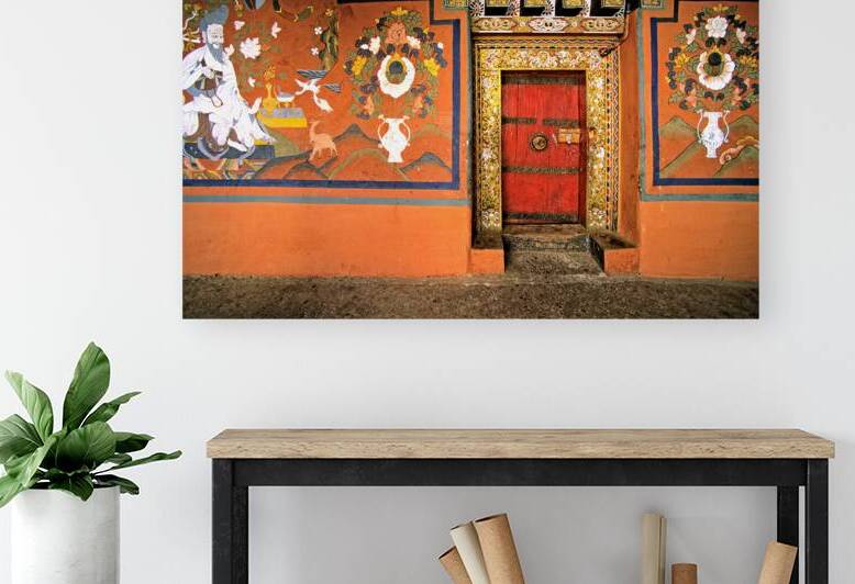 Vibrant wall murals and an ornate red door. by Marco Brivio