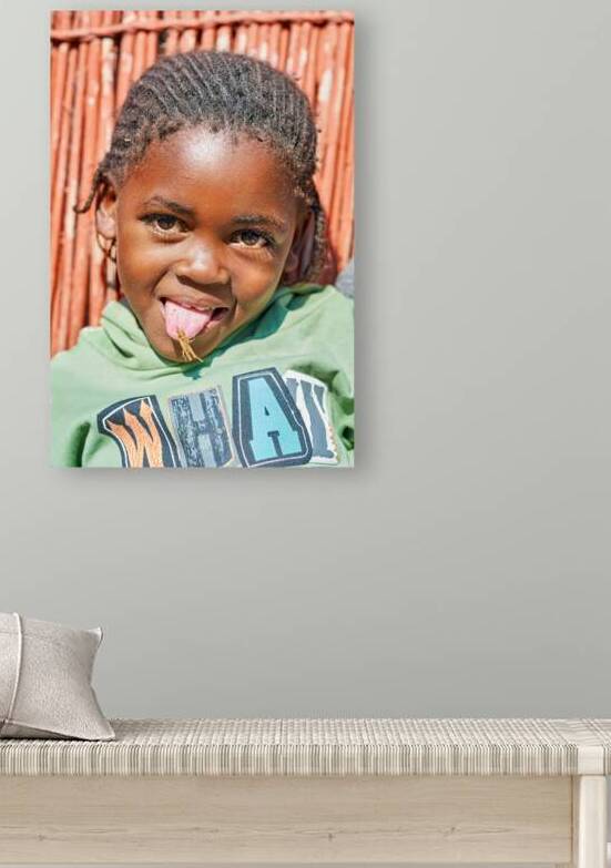 Happy child showing joy in Kavango Region of Namibia by Marco Brivio