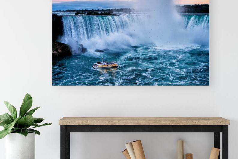Hornblower boat approaches powerful Niagara Falls. by Marco Brivio