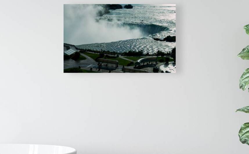 Niagara Falls with powerful water mist and surrounding park. by Marco Brivio