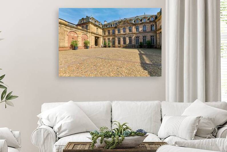 Visitors walk through courtyard at Palais Rohan in Strasbourg Al by Marco Brivio