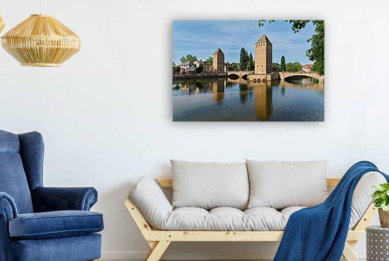 Covered bridges over water in Strasbourg Alsace France on a clea by Marco Brivio