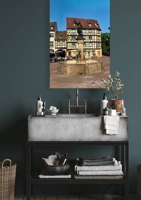 Timber framed houses and fountain in old town of Colmar Alsace by Marco Brivio