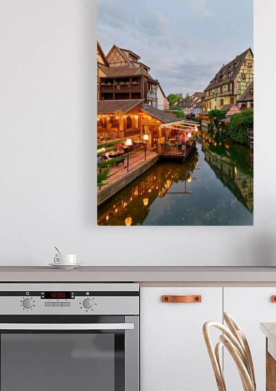 Timber framed houses and canal in Petite Venise Colmar at dusk by Marco Brivio