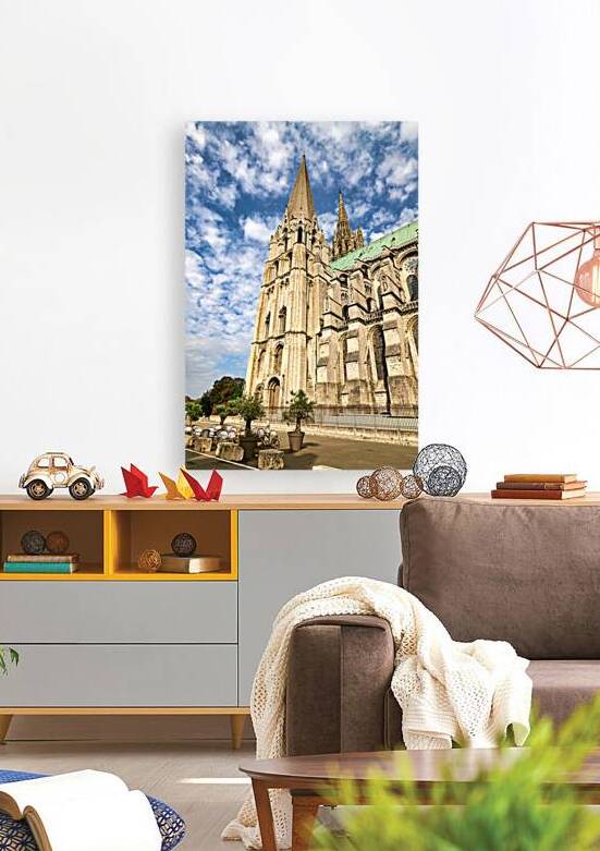 Chartres Cathedral stands tall against the blue sky in Chartres  by Marco Brivio