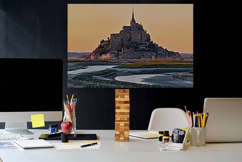 Mont Saint Michel in Normandy France during dusk with clear skie by Marco Brivio