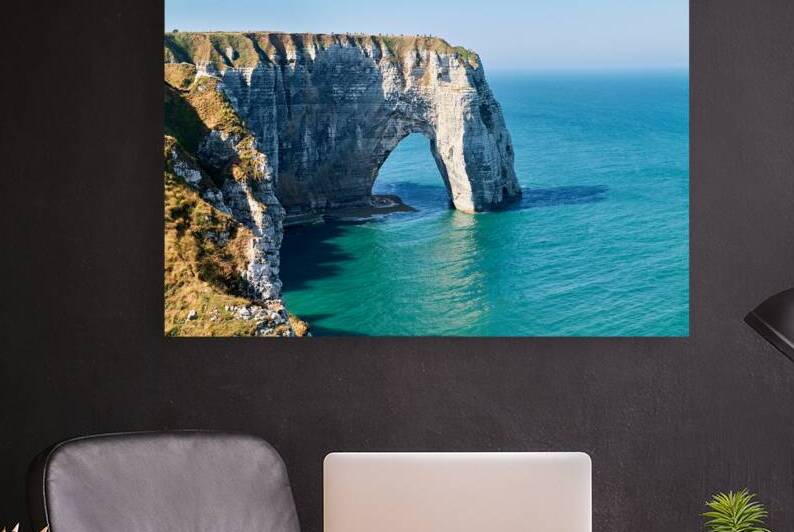 Chalk cliffs of Etretat along the coast of Normandy in France by Marco Brivio