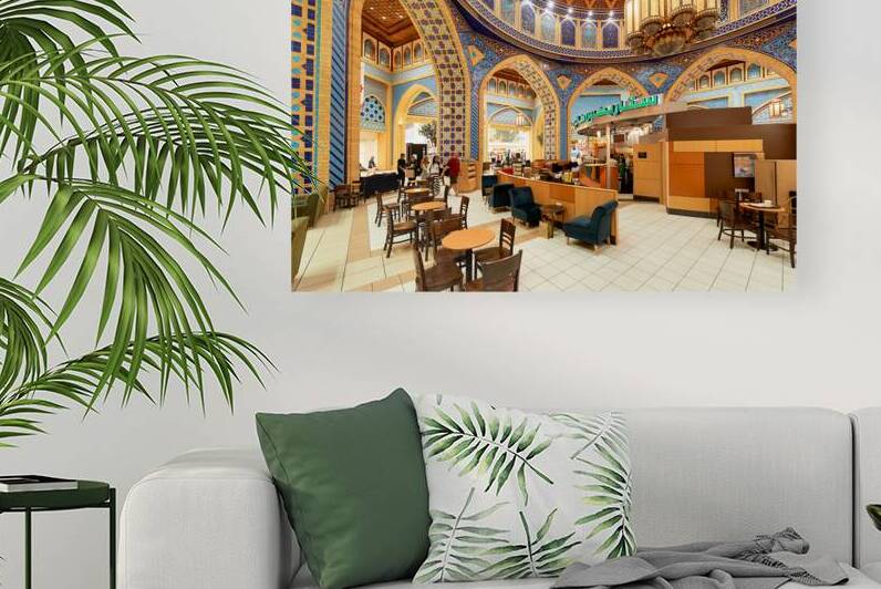 Starbucks store in decorated mall with customers in Dubai UAE by Marco Brivio