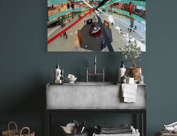 A busy mall in Dubai shows national flag ribbons and a sports ca by Marco Brivio