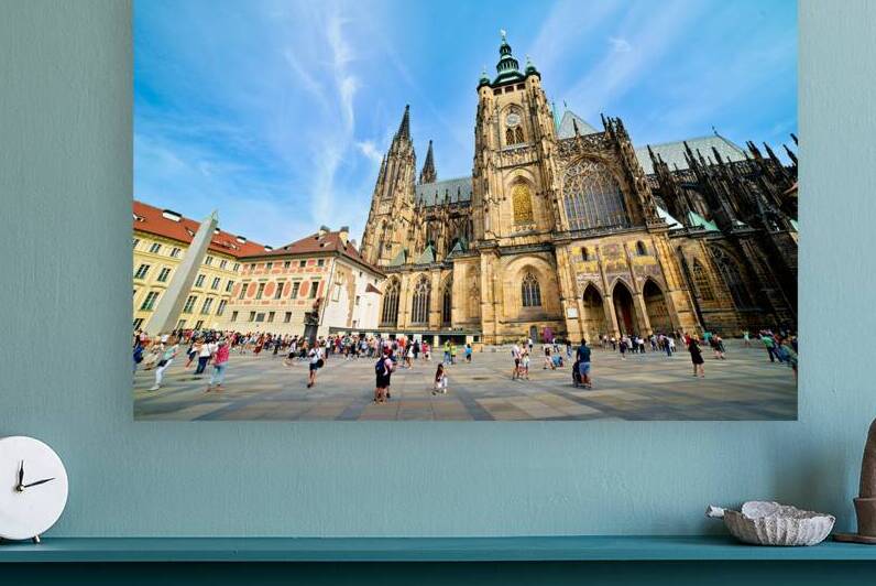 St. Vitus Cathedral in Prague with tourists on a sunny day. by Marco Brivio