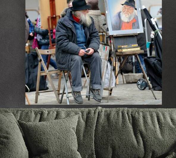 Artist sits next to portrait in Paris street market scene by Marco Brivio