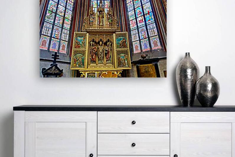 Ornate golden altarpiece and vibrant stained glass windows in a  by Marco Brivio