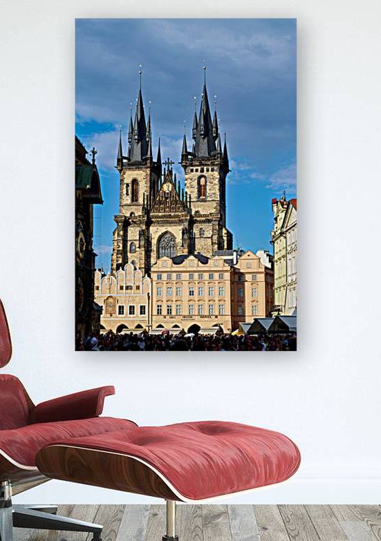 Pragues Týn Church towers over Old Town Square crowd. by Marco Brivio