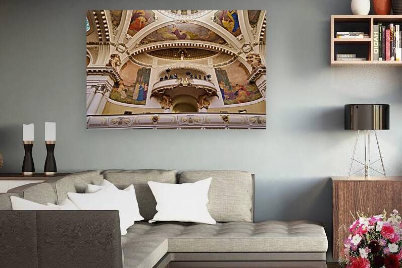 Ornate theater interior with murals sculptures and balcony. by Marco Brivio