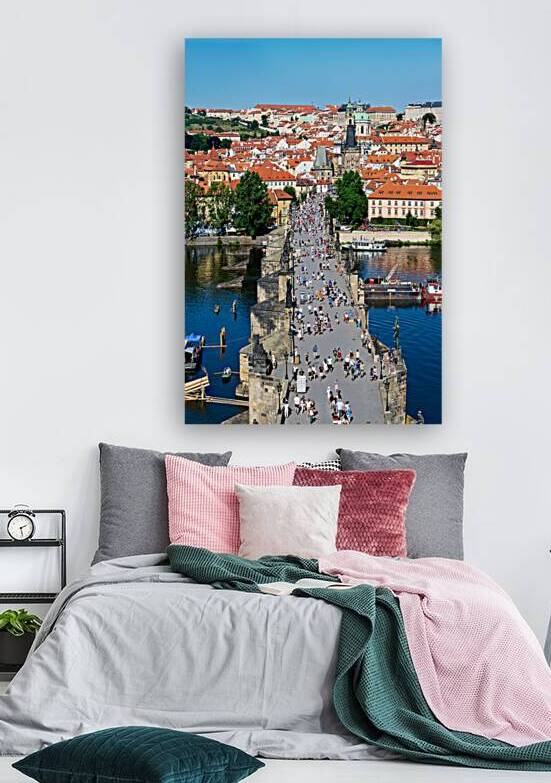 Iconic Charles Bridge Prague teeming with tourists. by Marco Brivio