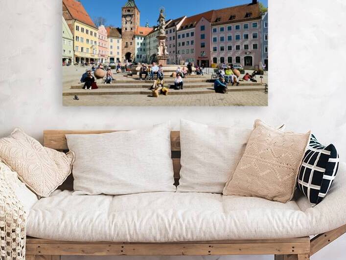 Visitors enjoy Hauptplatz square in Landsberg am Lech Bavaria by Marco Brivio