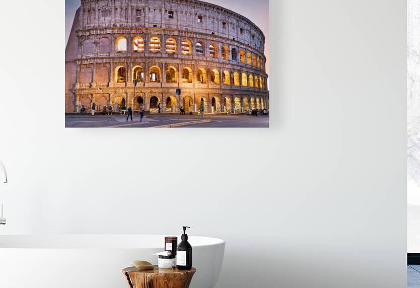 Visit Colosseum in Rome at dusk with its lights shining bright by Marco Brivio