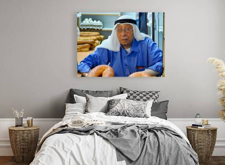 Baker working in the souq of the old city in Jerusalem Israel by Marco Brivio