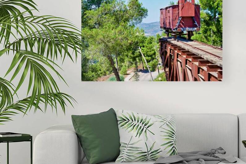A historic train car sits on tracks at Yad Vashem in Jerusalem by Marco Brivio
