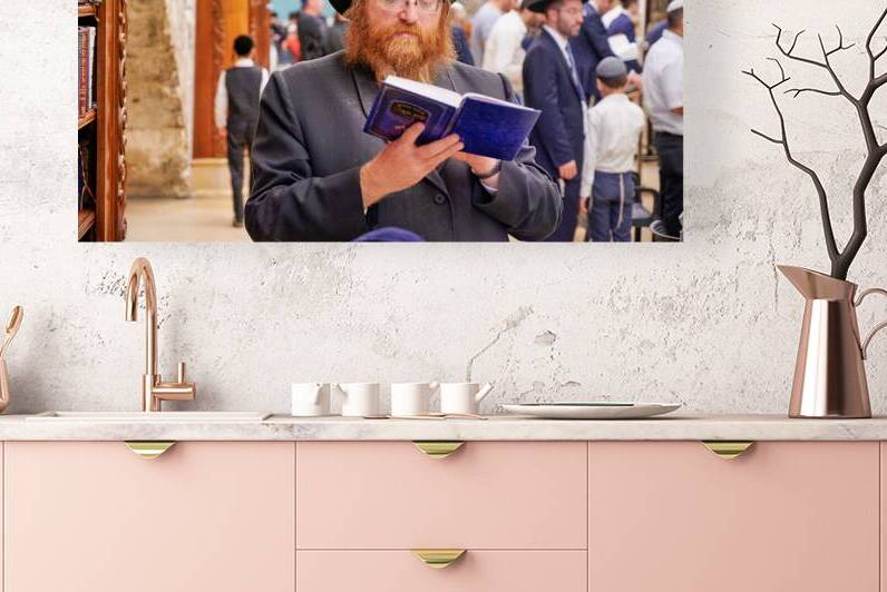 Orthodox Jews pray at the Western Wall in Jerusalem by Marco Brivio