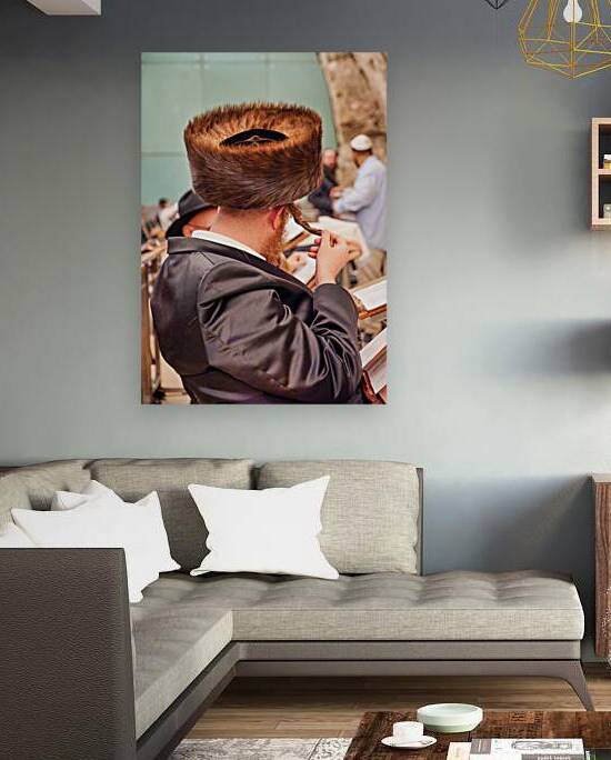 Orthodox Jews pray and read at the Wailing Wall in Jerusalem by Marco Brivio