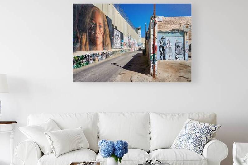 West Bank separation wall in Bethlehem shows murals and artwork by Marco Brivio