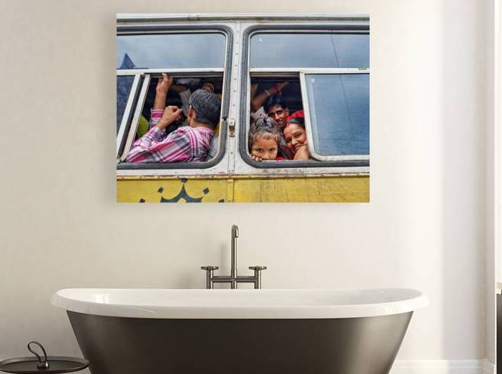 Passengers travel on a bus in Udaipur Rajasthan by Marco Brivio
